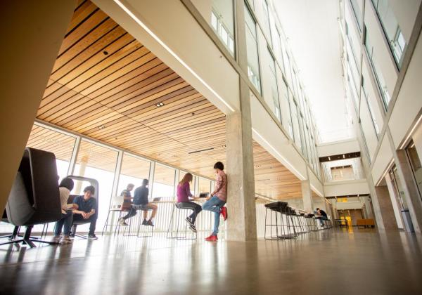 Inside building 110 with people sitting