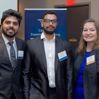 Two students and one employer posting at the 2019 Business Mixer at the Coast Bastion Hotel